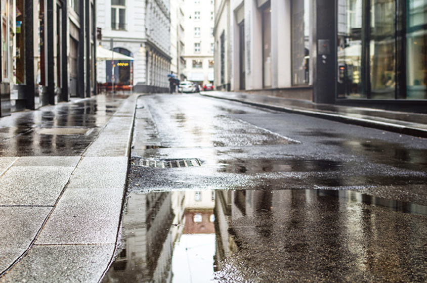 Across-driving-surface-wet-road