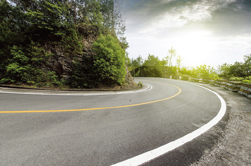 Across-driving-surface-curved-road
