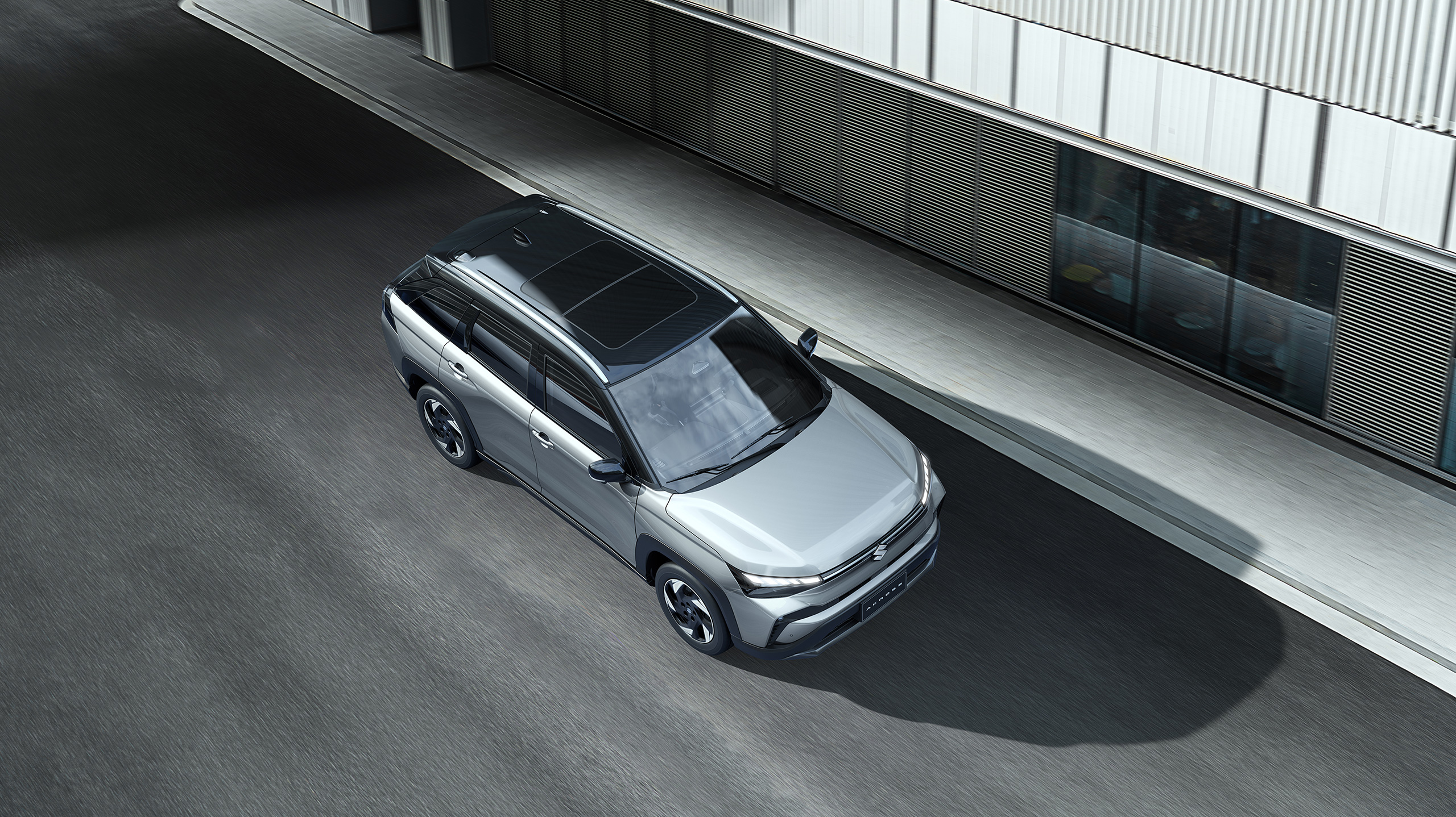 Across-SUV-driving-through-modern-architecture