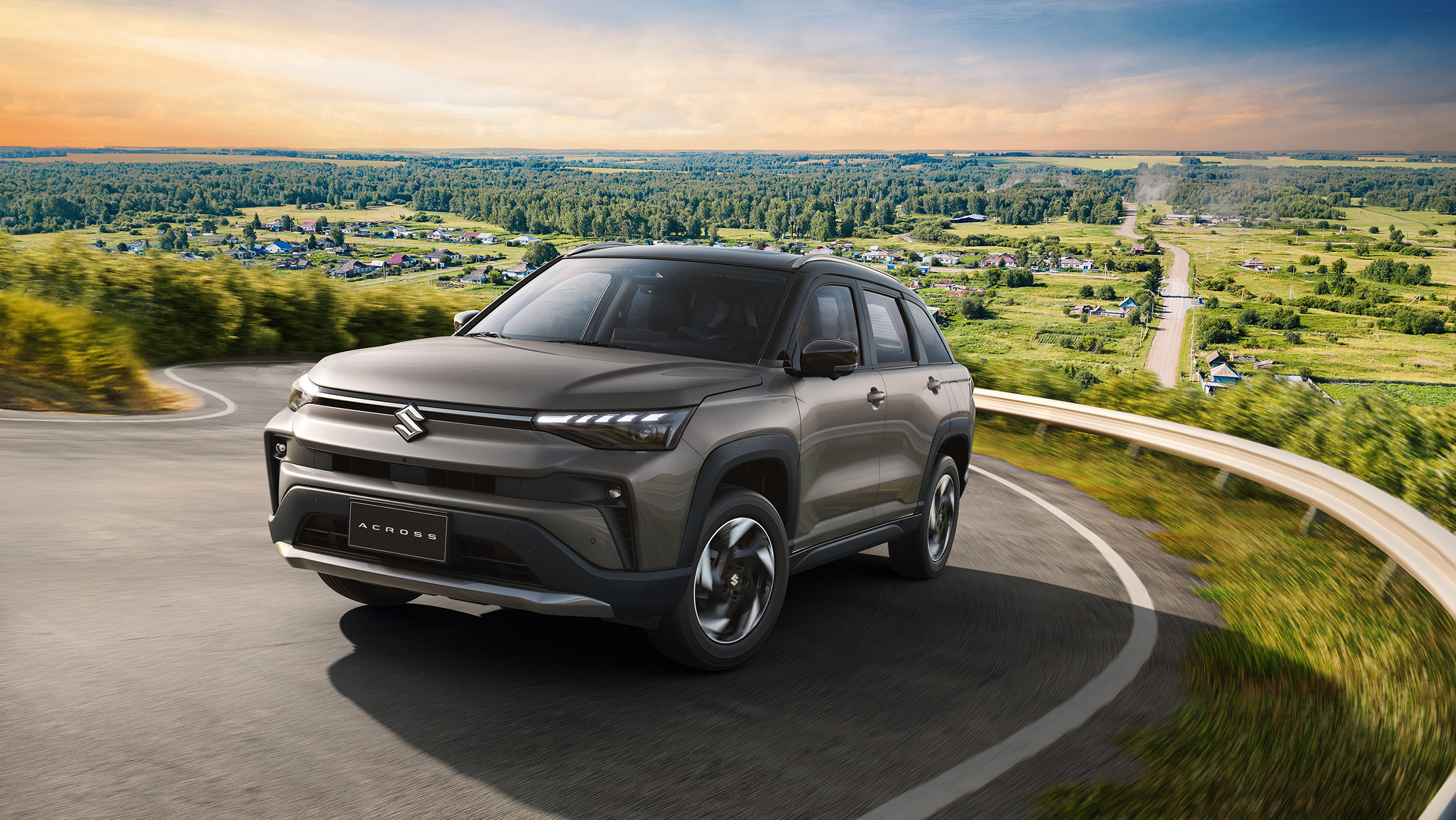 Across-SUV-driving-on-scenic-winding-road