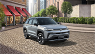 Across-silver-SUV-driving-in-urban-street