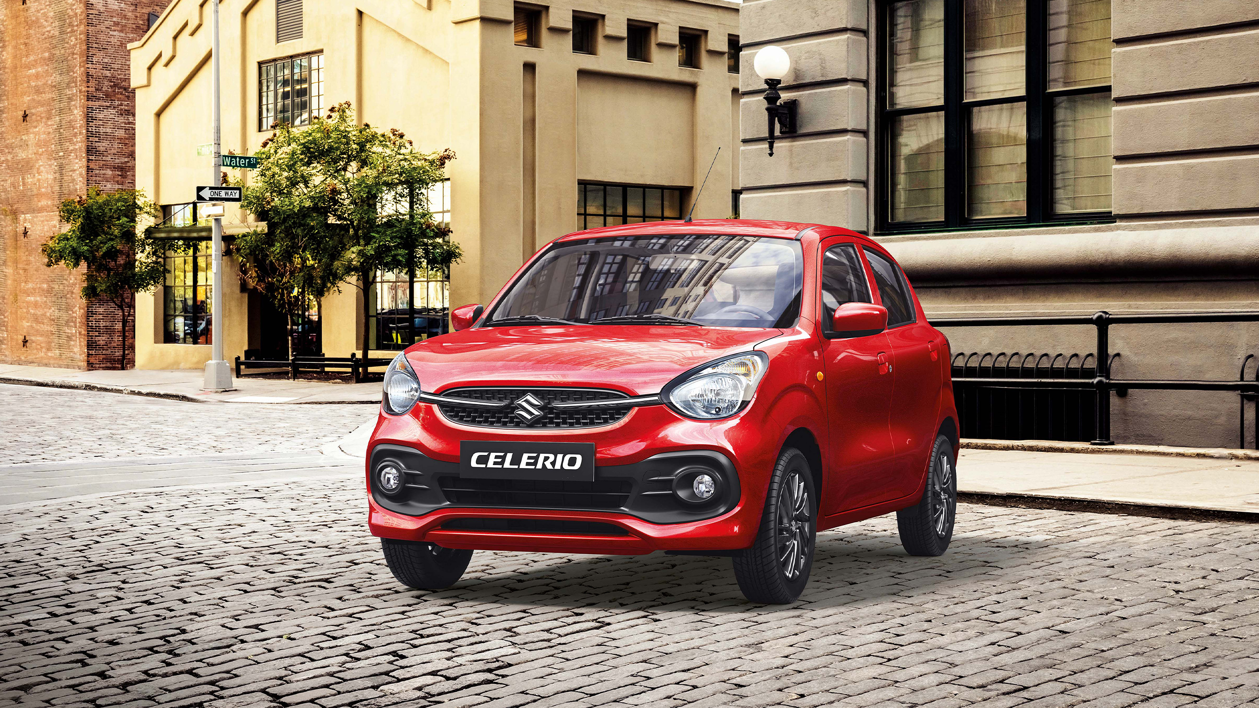 Red-Suzuki-Celerio-parking-in-front-of-a-shop