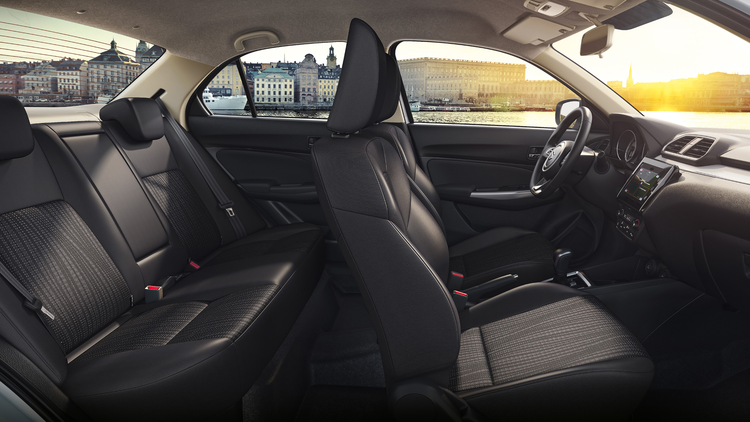 Side-shot-of-Dzire-interior-with-cityscape-outside