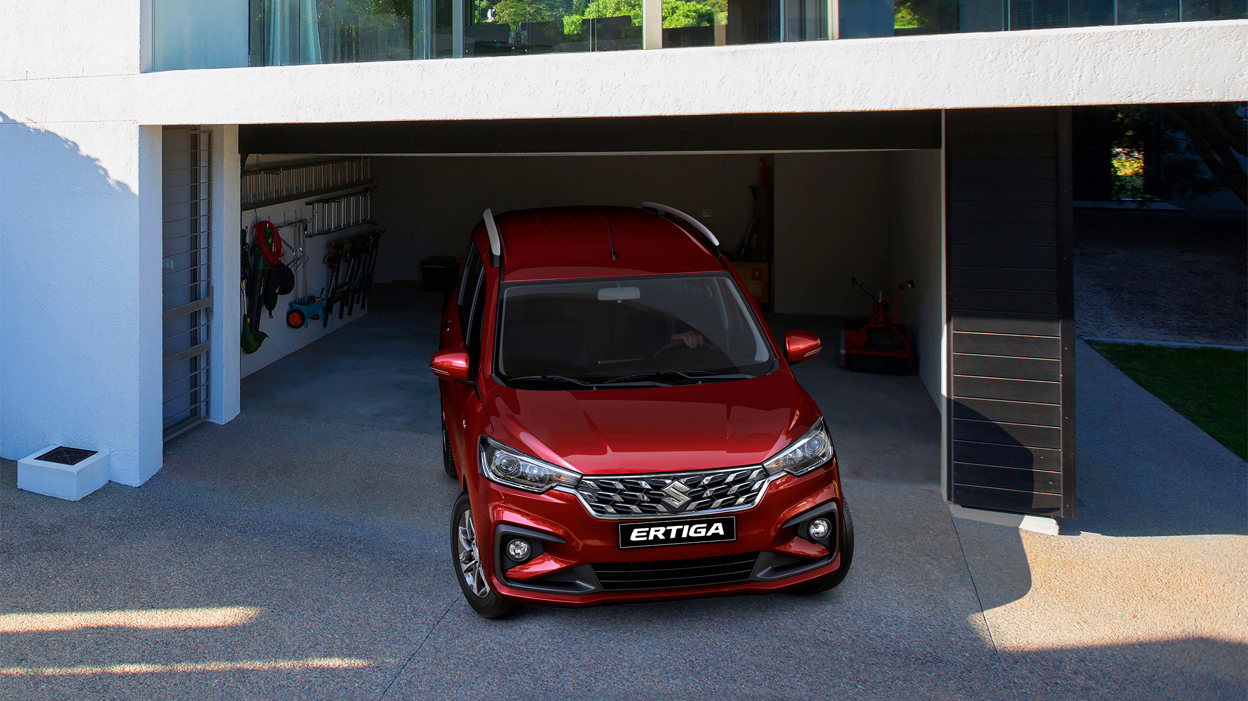 Red-Suzuki-Ertiga-departing-from-the-house