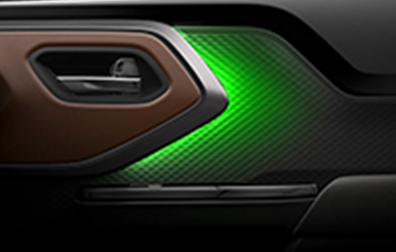 suzuki-e-vitara-interior-door-panel-with-green-ambient-lighting-close-up