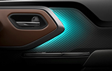 suzuki-e-vitara-interior-door-panel-with-turquoise-ambient-lighting-close-up