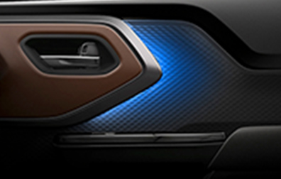 suzuki-e-vitara-interior-door-panel-with-blue-ambient-lighting-close-up