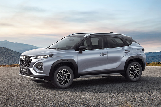 Silver-Suzuki-Fronx-parking-on-top-of-mountain