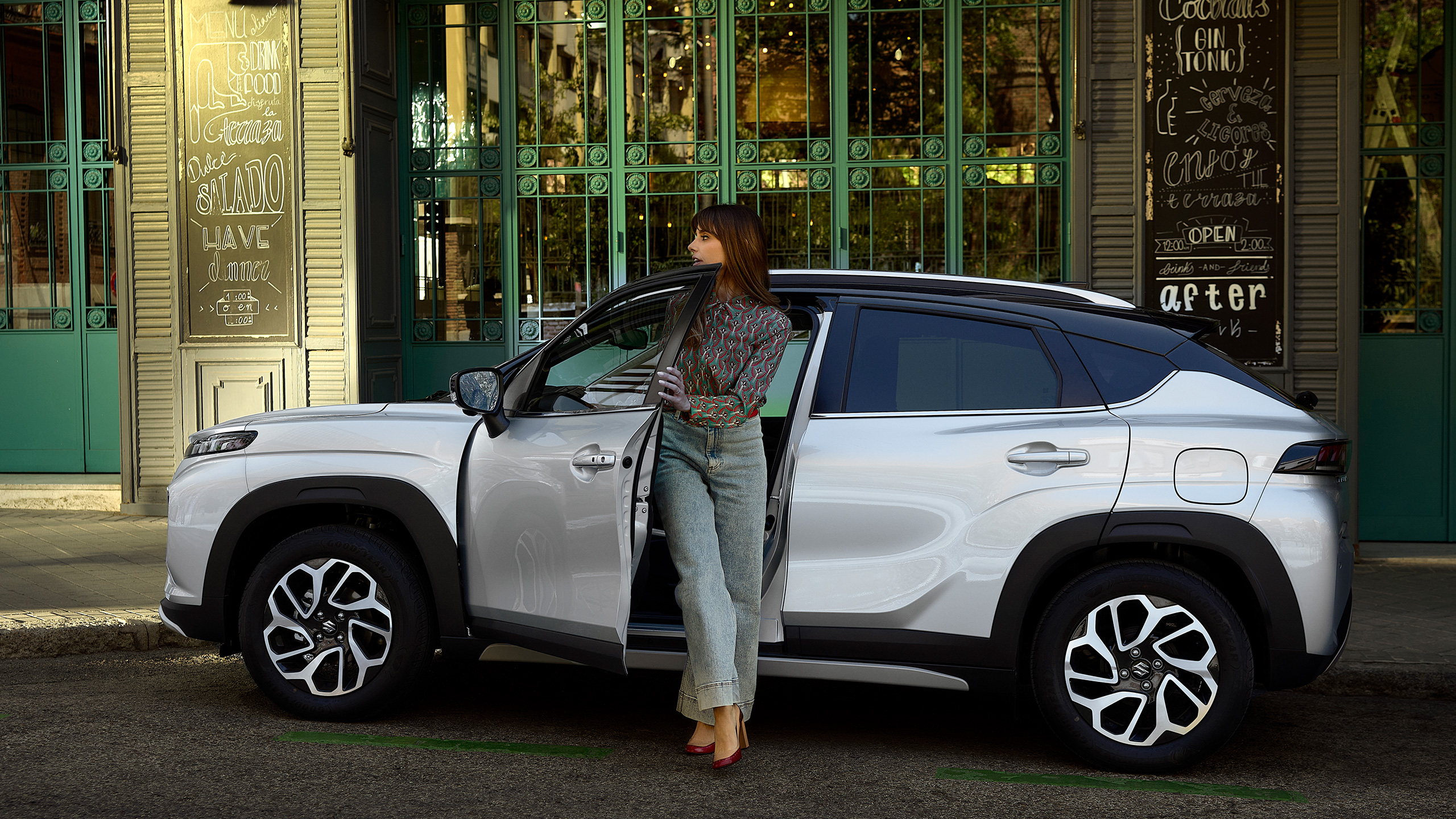 Suzuki-Fronx-female-leaving-car