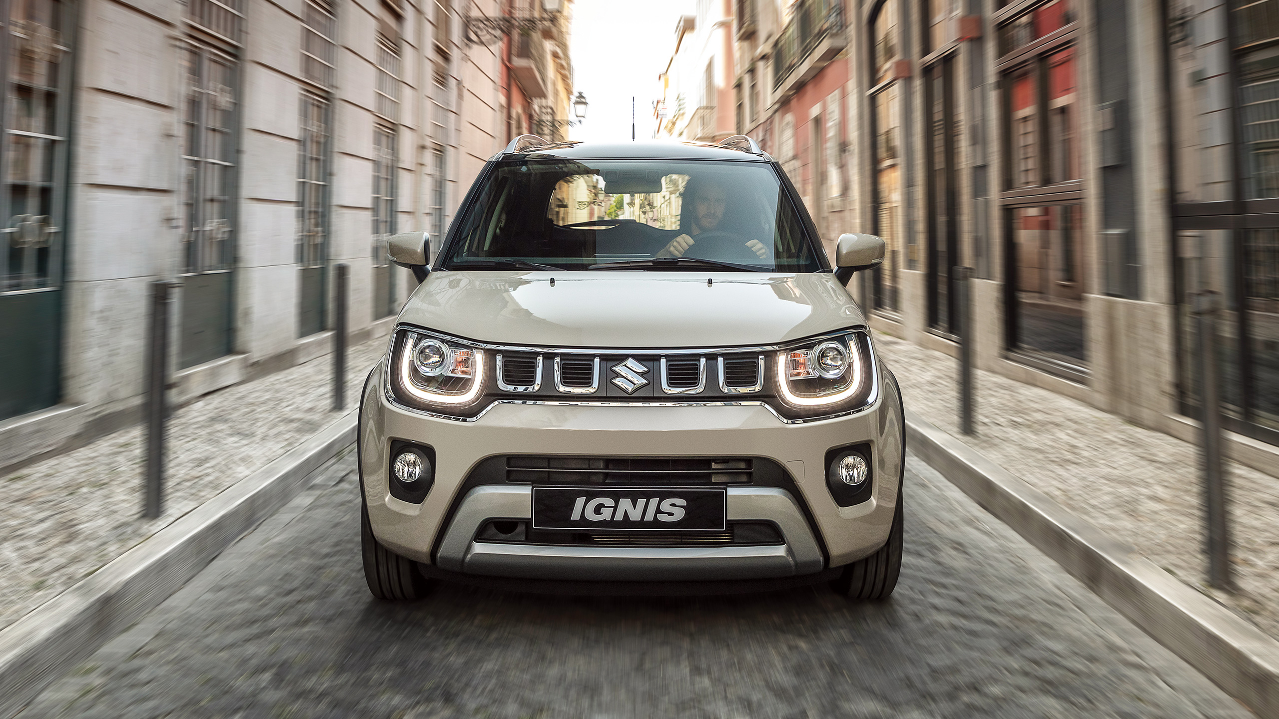 Ignis-front-face-driving-on-cobble-road