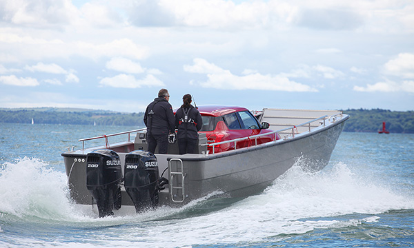 Picture of Journalists Surprised with Swift Car on Boat in England③